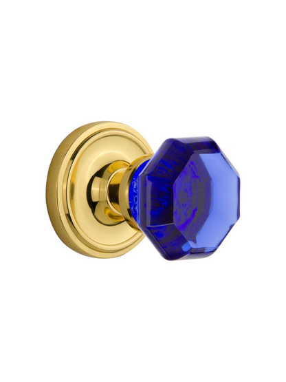 Classic Rosette Door Set with Colored Waldorf Crystal Glass Knobs Cobalt Blue in Polished Brass.